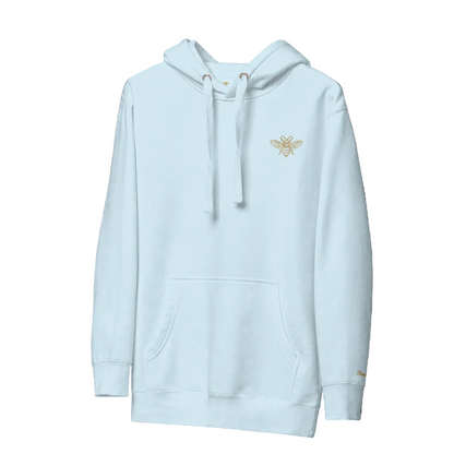 Light blue hoodie with a logo on the chest against a black background